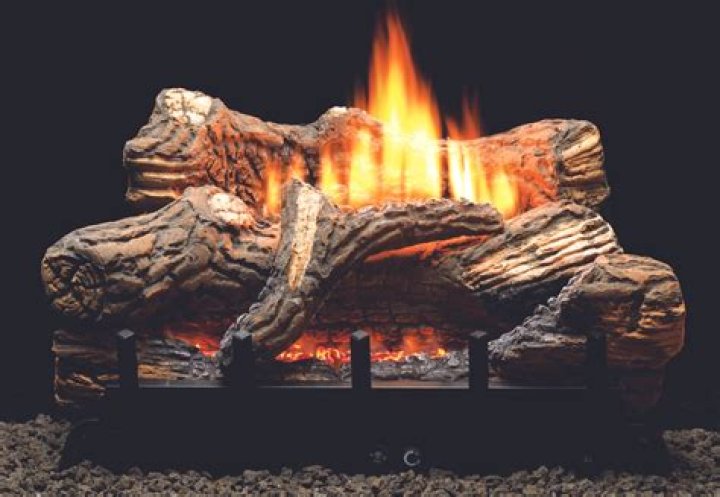 Can I use real logs in a gas fireplace