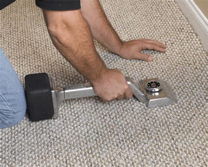 Do you need a power stretcher to install carpet