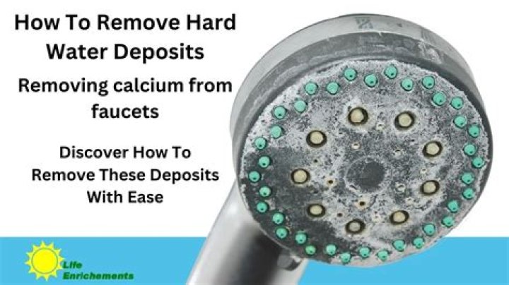How do I remove calcium deposits from my kitchen faucet