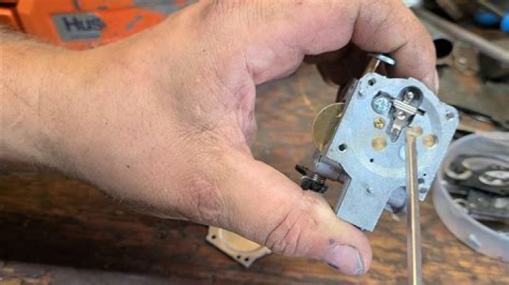 How do you adjust a Tillotson carburetor