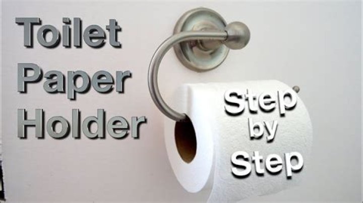 How do you attach a toilet paper holder to tile