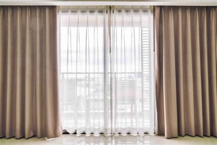 How do you connect two curtain panels together