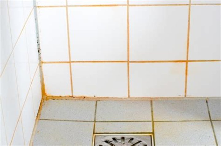 How do you get orange stains off bathroom tiles