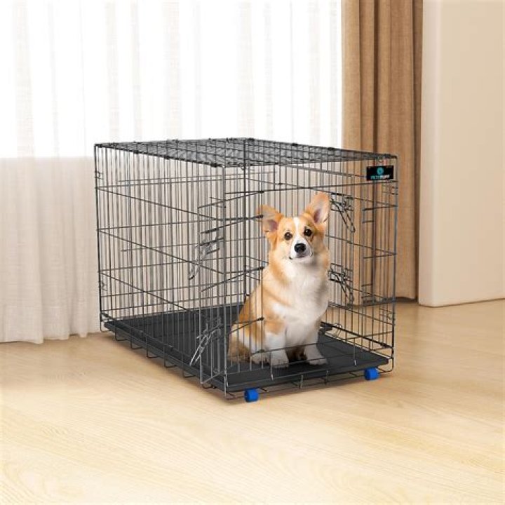 How do you make a large crate smaller for a puppy