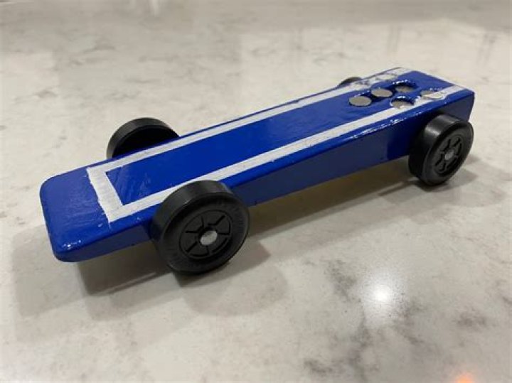 How do you put weights on a Pinewood Derby car