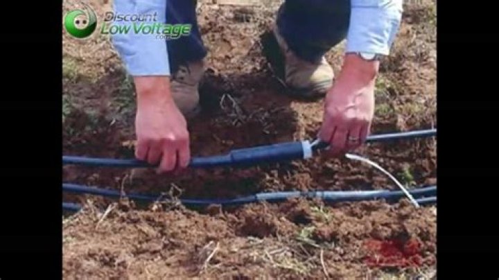 How do you splice underground sprinkler wire