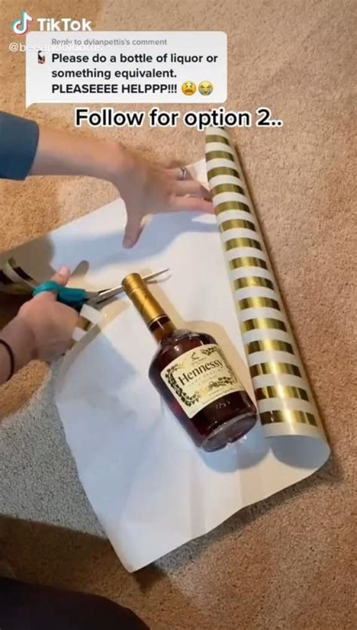 How do you wrap a liquor bottle with wrapping paper