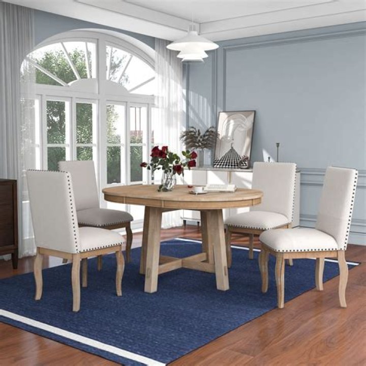 How much does a dining room table and chairs cost