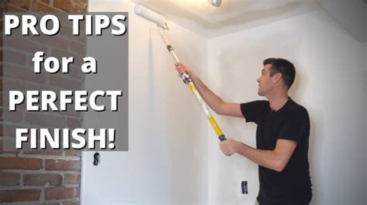 Should I prime drywall behind cabinets
