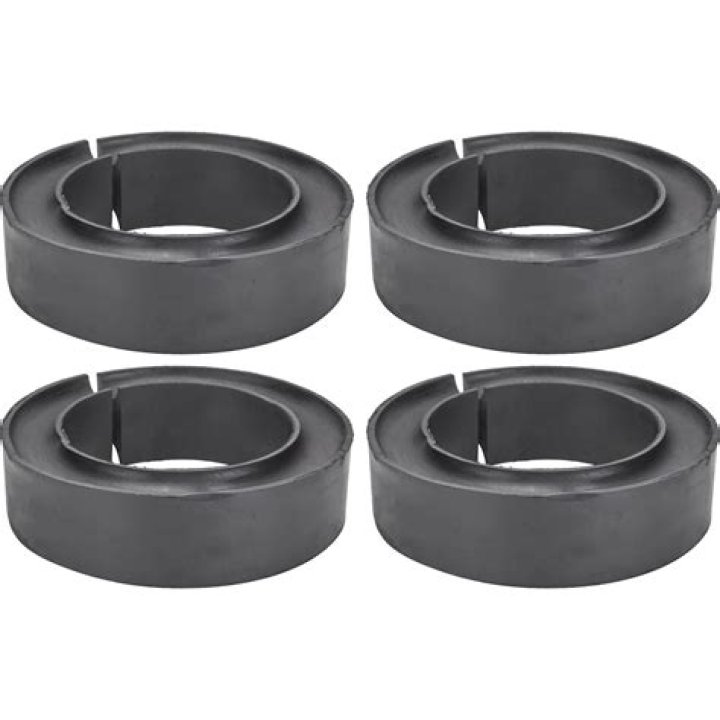 What are coil spring spacers used for