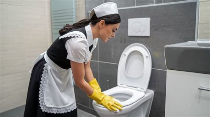 What causes black soot on toilet seat