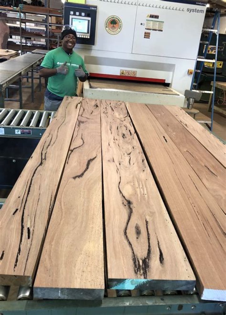 What causes holes in pecky cypress