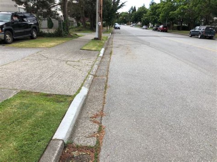 What does a GREY painted curb mean