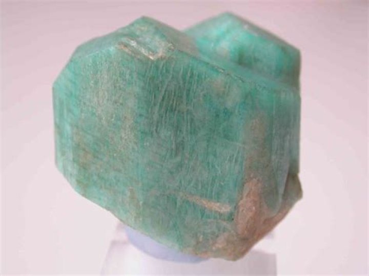 What does feldspar do in a glaze