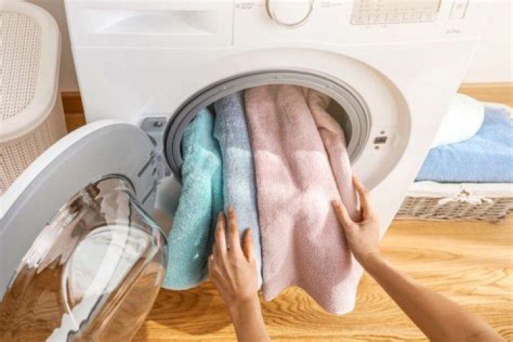 What temperature should towels be washed in