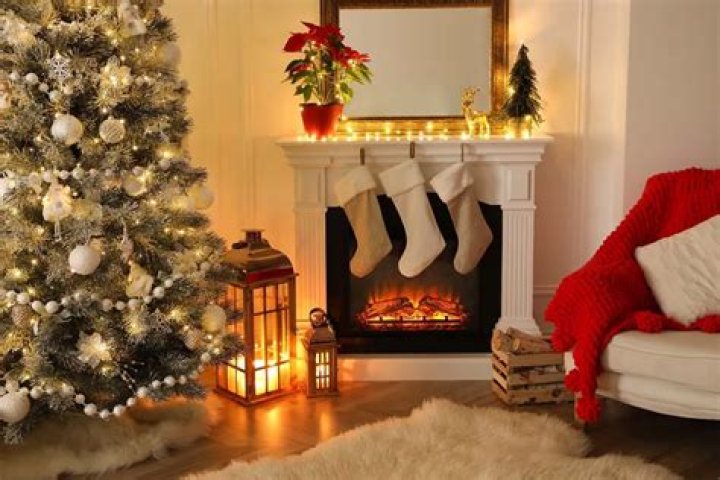 Which country originated the tradition of hanging stockings on the fireplace