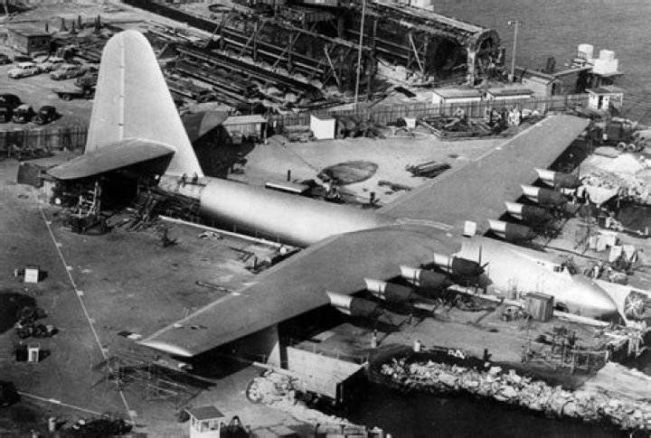 Who bought out Hughes Aircraft