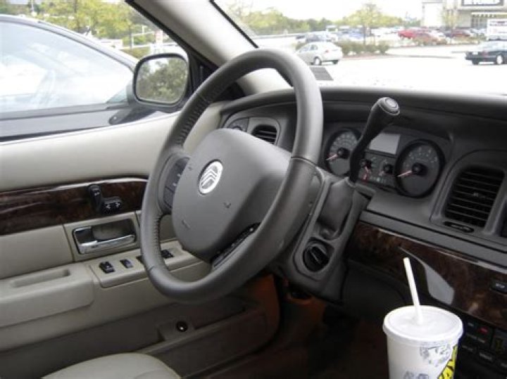 Why do American cars have column shifters