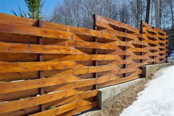 Why does pressure treated wood feel wet