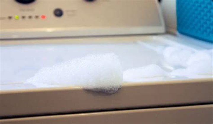 Why is my washing machine full of soap suds